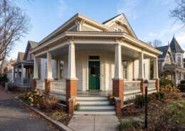 Front porch, columns and painted trim on a Del Ray bungalow in winter light