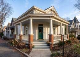Front porch, columns and painted trim on a Del Ray bungalow in winter light
